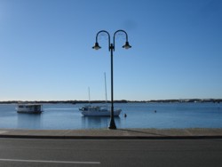 View across Marine Parade, Labrador on a calm day.