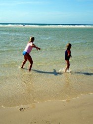 Australian school holidays are a great excuse to go to the beach. Coolangatta beach during school holidays