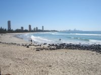View of Burleigh Beach in Winter looking back towards Surfers Paradise skyline